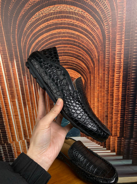 alt
Scarpe da guida nere senza tempo effetto coccodrillo