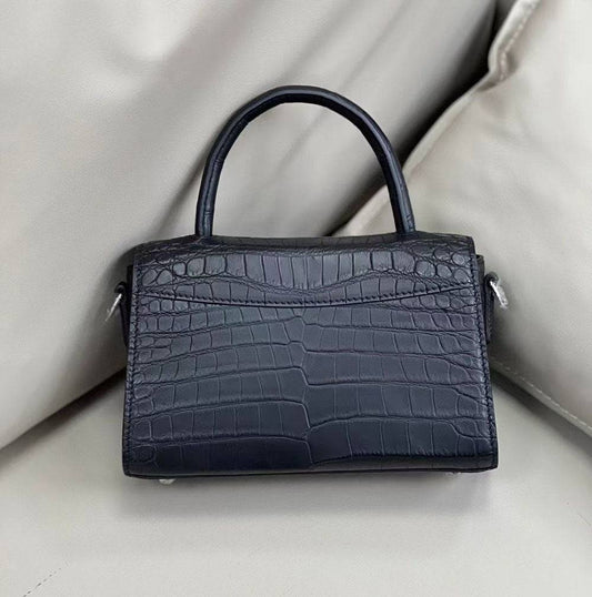 alt
Borsa tote con manici superiori in vera pelle di coccodrillo