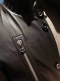 Black Leather Jacket Trimmed With The Classic Ribbed Jersey Cuffs, Collar